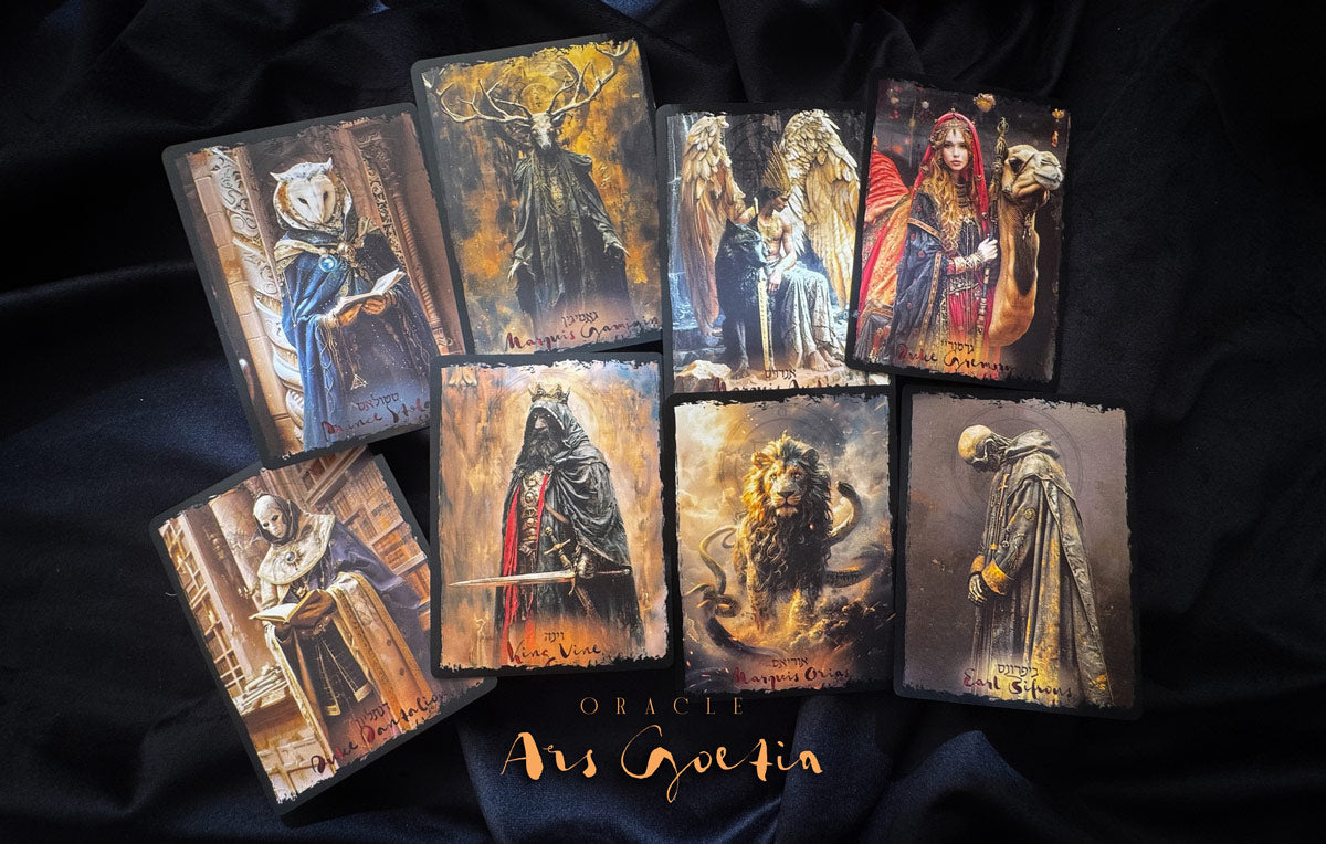 Collection of tarot cards with gothic art on a dark fabric background