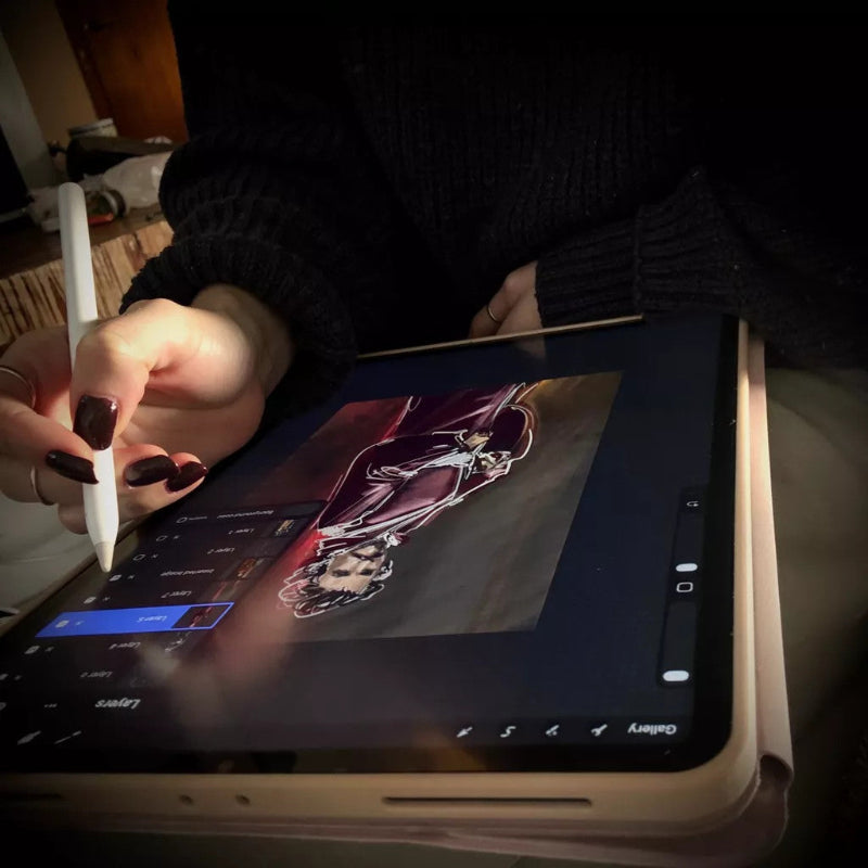 Person using a stylus on a tablet with a digital drawing displayed.